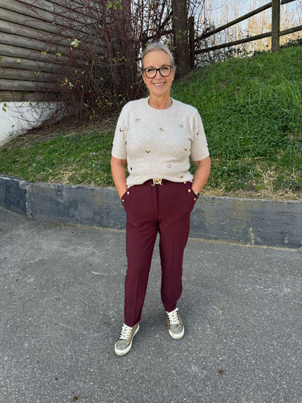 Pantalon met gouden knopen